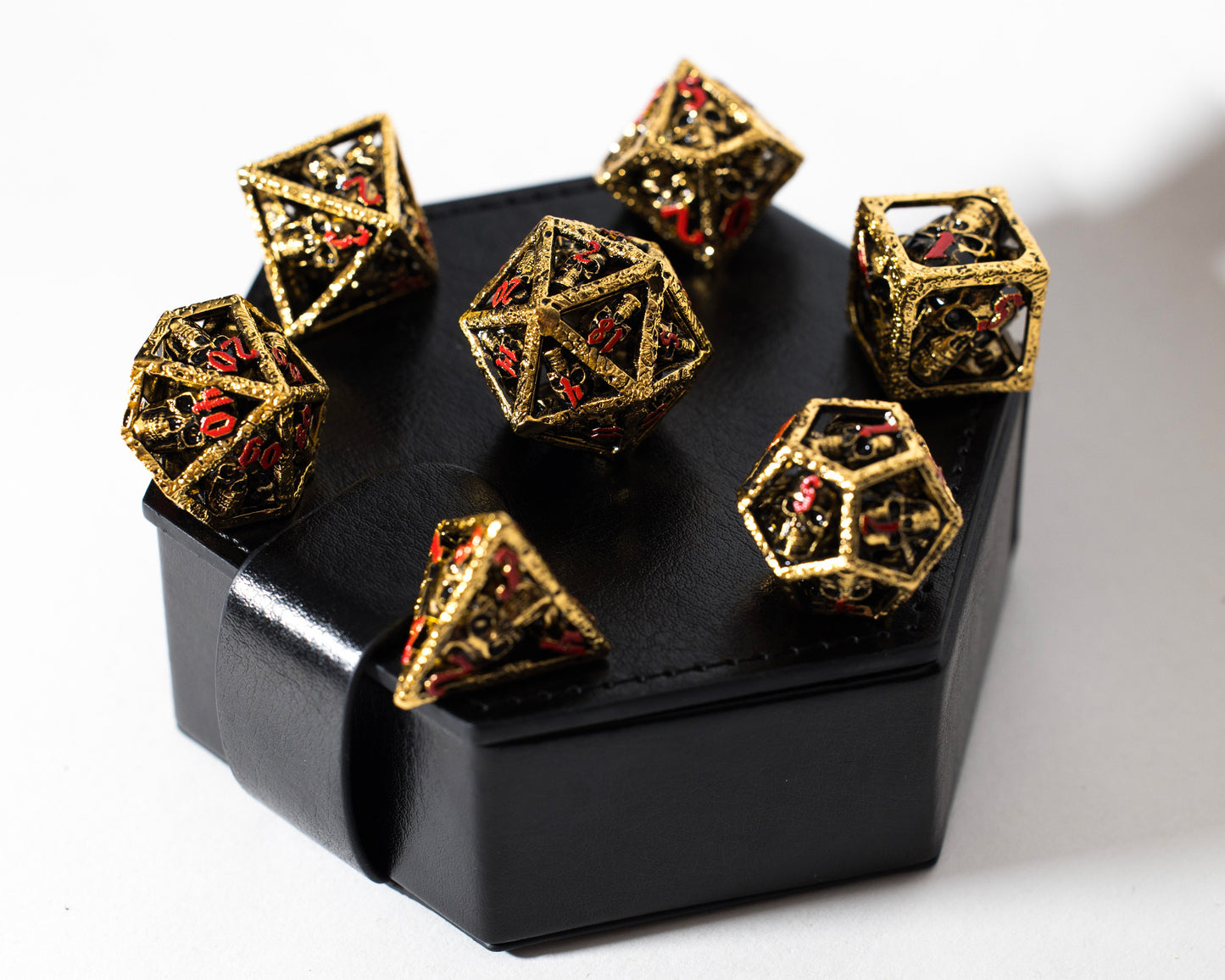 Shop Skull's Grin - Gold with Red at Dragonheart Dice