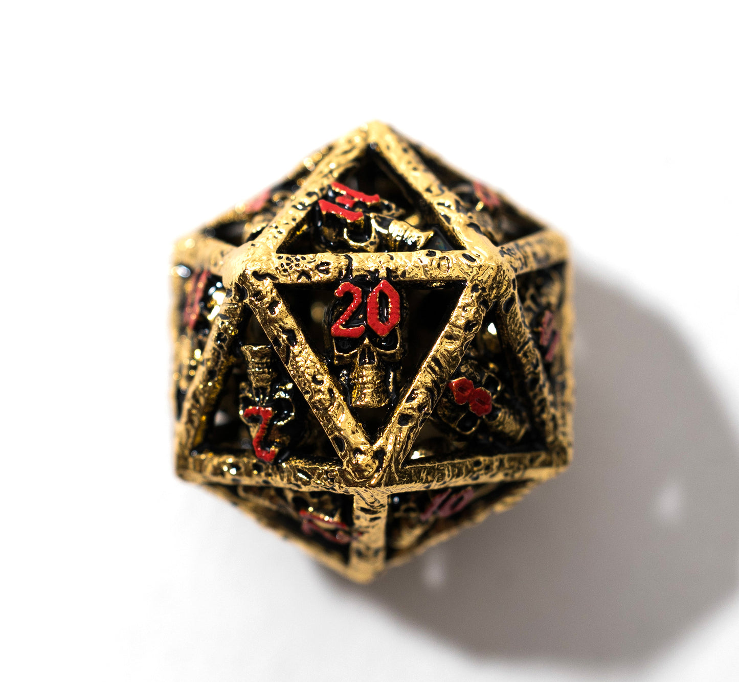 Shop Skull's Grin - Gold with Red at Dragonheart Dice