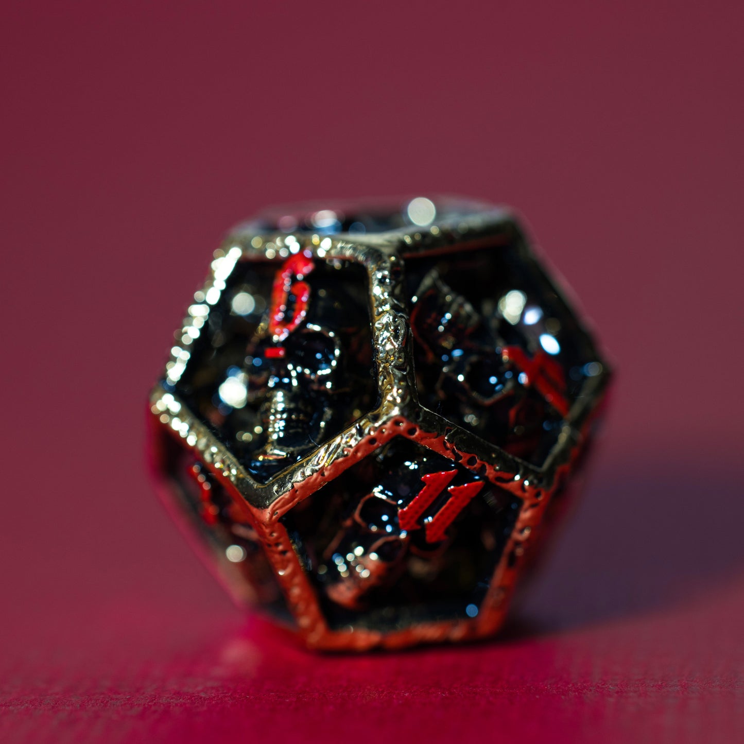Shop Skull's Grin - Gold with Red at Dragonheart Dice