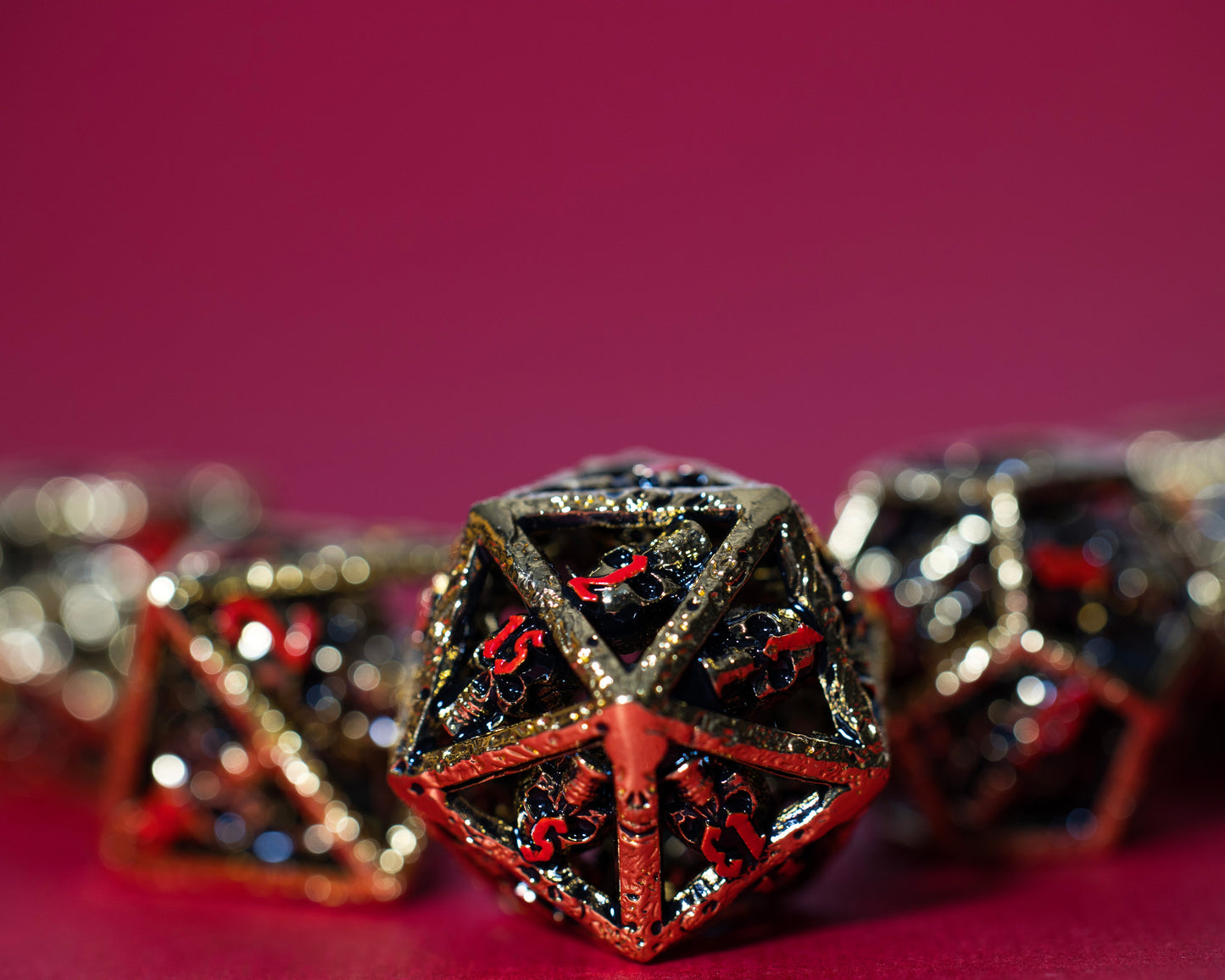 Shop Skull's Grin - Gold with Red at Dragonheart Dice