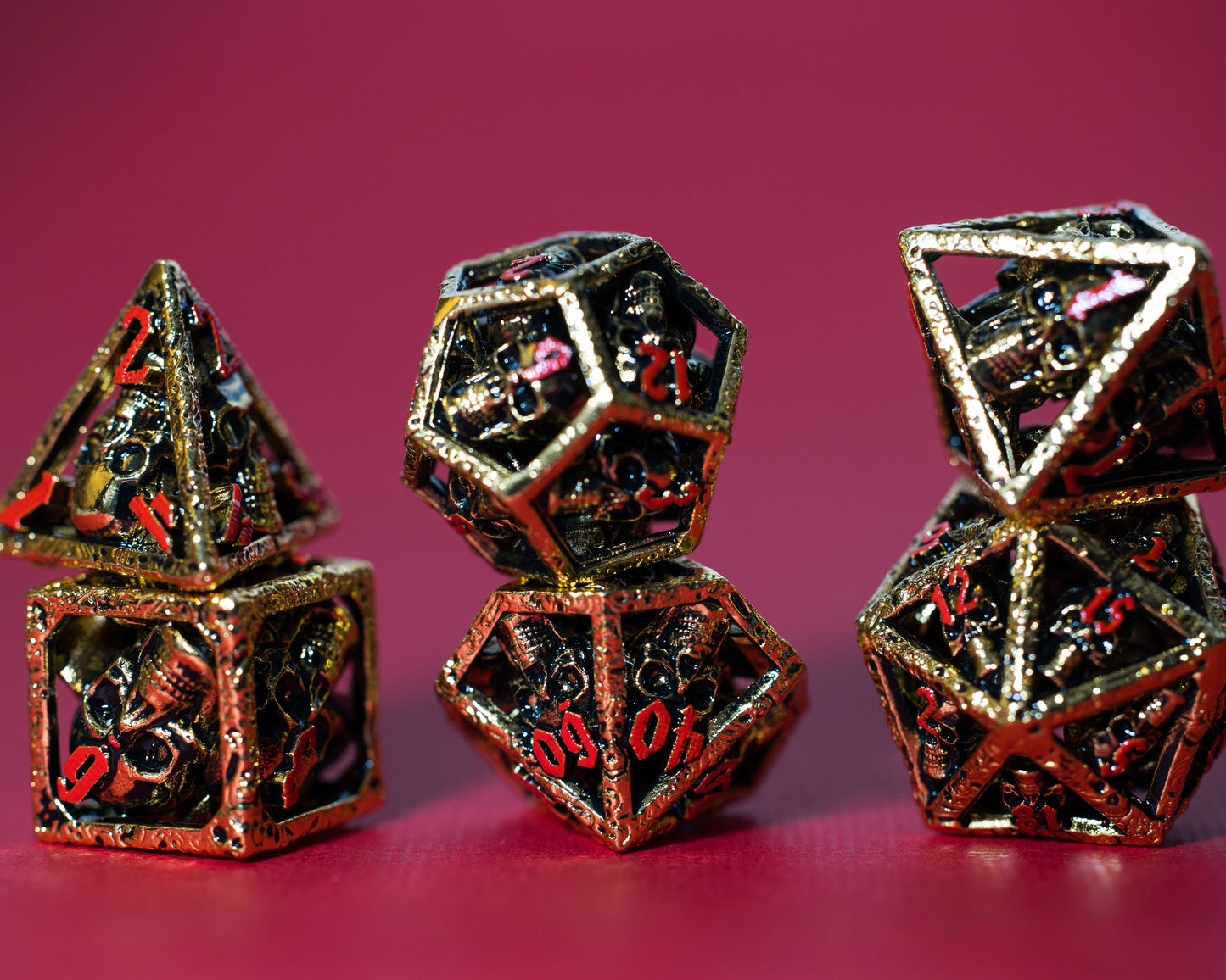 Shop Skull's Grin - Gold with Red at Dragonheart Dice