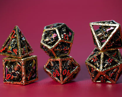 Shop Skull's Grin  - Gold with Red at Dragonheart Dice